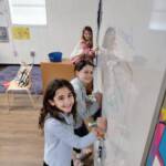girlswritingonboard